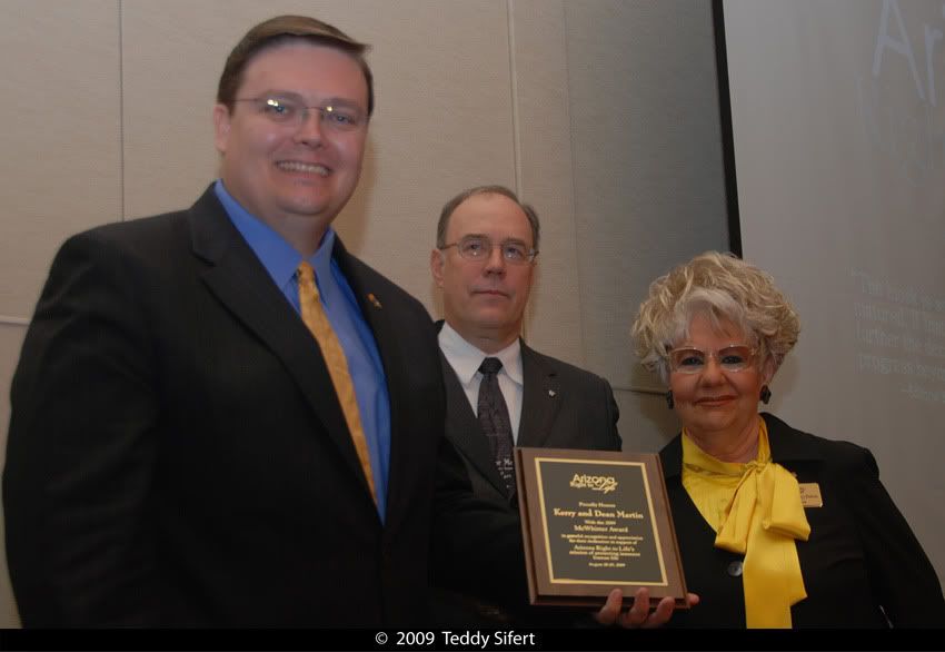 Photo of Dean Martin accepting the McWhirter Award given to Dean & Kerry Martin