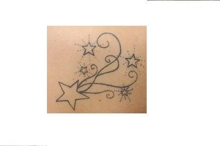 This is another shooting star tattoo design with two stars that cross paths. 