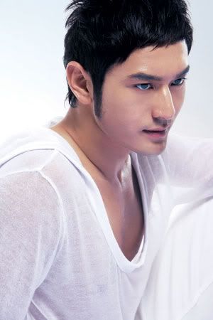 Huang Xiao Ming in white